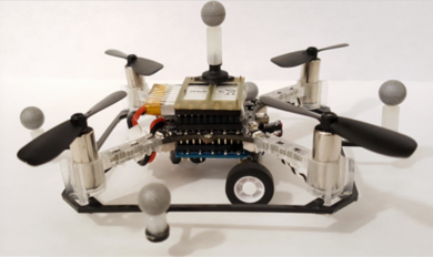 One of the researchers' quadcopter drones with wheels.