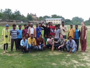 “You could think of the cricket pitch as a microcosm of caste issues in India,” says Matt Lowe (bottom, second from right), a PhD candidate leading a study in India to see if the popular game of cricket can help bridge caste divides.