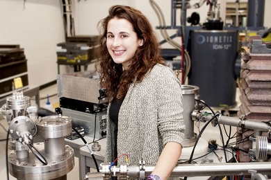 Graduate student Leigh Ann Kesler researches the effects of hot plasma on the interiors of fusion devices using a 2 megavolt electrostatic accelerator called DANTE in the Vault Laboratory for Nuclear Science at the Plasma Science and Fusion Center.