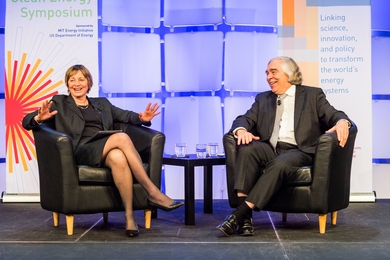 MIT Vice President for Research Maria Zuber and former U.S. Secretary of Energy Ernest Moniz, the Cecil and Ida Green Professor of Physics and Engineering Systems emeritus at MIT, engaged in a fireside chat at the C3E Women in Clean Energy Symposium, discussing technology, policy, and the importance of women's leadership in STEM fields.