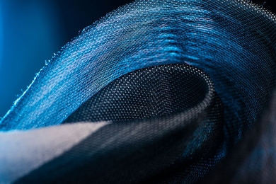 Unique fabrics woven with microstructured polymer fibers and containing microelectronics will be transitioned into integrated systems at the Defense Fabric Discovery Center at Lincoln Laboratory.