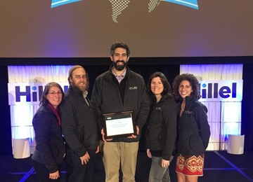 MIT Hillel accepts the Phillip and Susan Rudd Cohen Outstanding Campus Award at the Hillel International Global Assembly held in Denver.