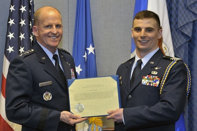 In a Pentagon ceremony, MIT Air Force ROTC Cadet Nicholas James is presented the Cadet of the Year Award by Air Force Vice Chief of Staff Gen. Stephen Wilson.