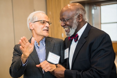 Honorees Ahmed Ghoniem (left) and Wesley Harris enjoy the Committed to Caring celebration on April 11.
