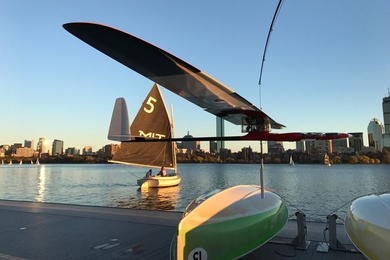 An albatross glider, designed by MIT engineers, skims the Charles River.