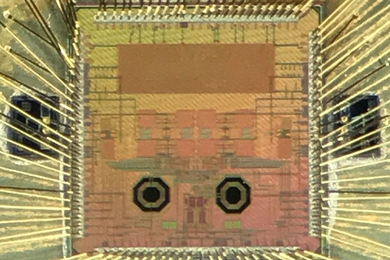 MIT researchers developed a transmitter that frequency hops data bits ultrafast to prevent signal jamming on wireless devices. The transmitter’s design (pictured) features bulk acoustic wave resonators (side boxes) that rapidly switch between radio frequency channels, sending data bits with each hop. A channel generator (top box) each microsecond selects the random channels to send bits. Two tra...