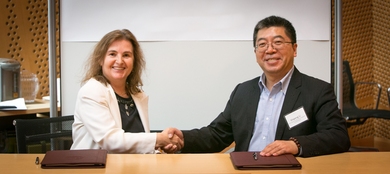 MIT Professor and CSAIL Director Daniela Rus (left) and iFlyTek Chairman and CEO Qingfeng Liu sign a five-year research agreement between the two organizations.