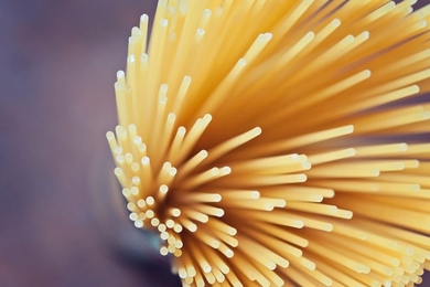 Could a dry spaghetti noodle ever be coerced to break into only two pieces?