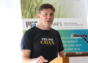 Christopher Voigt, a professor of biological engineering, presents the latest research results for a J-WAFS-funded project that seeks to engineer cereal grains to produce their own fertilizer. 
