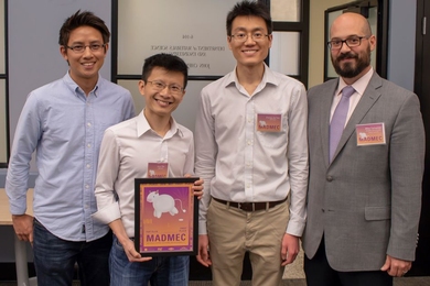 The Fiat Flux team earned the $10,000 first-place prize for its prototype of a self-cleaning water filtration system. Team members pose with Michael Tarkanian (right), a senior lecturer in the Department of Materials Science and Engineering (DMSE) who runs MADMEC. Team members pictured are: (from left to right) Gabriel Loke, Alvin Tan and Zheng Jie Tan.