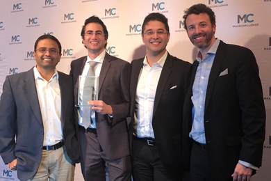 The Infinite Cooling team accepts the $100K Diamond Winner Award at the MassChallenge Awards on Oct. 17 in Boston. Left to right: co-founder Associate Professor Kripa Varnasi, co-founder Maher Damak, co-founder Karim Khalil, and COO Derek Warnick. 