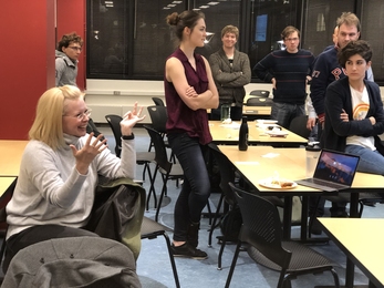 At a recent meeting, the MIT AI Ethics Reading Group debated options for teaching ethics in a traditional computer science curriculum. Postdoc Abby Jaques (left) is developing ethics modules that can be incorporated into existing coursework.