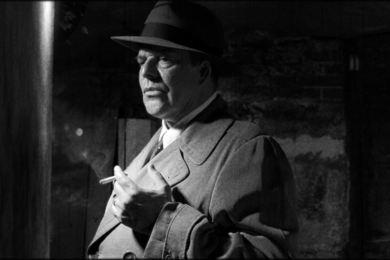 Singer Omar Ebrahim as Arnold Schoenberg as Humphrey Bogart, from "Schoenberg in Hollywood"