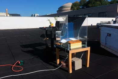 In this experiment, the new steam-generating device was mounted over a basin of water, placed on a small table, and partially surrounded by a simple, transparent solar concentrator. The researchers measured the temperature of the steam produced over the course of the test day, Oct. 21, 2017.