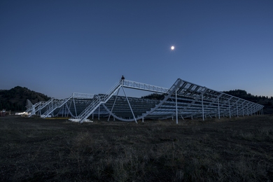 The Canadian Hydrogen Intensity Mapping Experiment (CHIME) is a radio telescope designed to answer major questions in astrophysics and cosmology, including the phenomena of Fast Radio Bursts (FRBs), fleeting and intense radio bursts with an unknown origin. The telescope is located in the mountains of British Columbia’s Okanagan Valley at the NRC’s Dominion Radio Astrophysical Observatory.