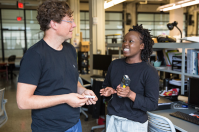 Professor Reinhart (left) and architecture graduate student Hellen Rose Anyango Awino discuss a class assignment on measuring thermal comfort.