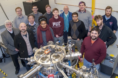 Members of the the PSFC's High-Energy-Density Physics division gather in their Accelerator Facility, part of the new Center of Excellence.