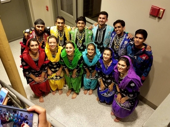 Members of the MIT Bhangra dance team pose for a picture after a performance.