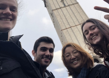 MIT spring exchange students gather by Imperial College London's iconic Queen's Tower: (l-r) Lily Bailey, Michael Hiebert, Dain Kim, Sara Wilson.