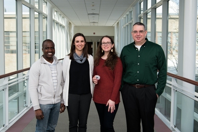 Left to right: Raoul Ouedraogo, Kate Byrd, Annie Weathers, and Eric Phelps make up the team at Lincoln Laboratory developing the nanoscale battery technology.