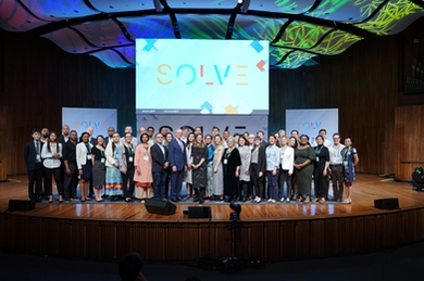 MIT President L. Rafael Reif and Solve Executive Cirector Alex Amouyel recognize Solver teams on stage.