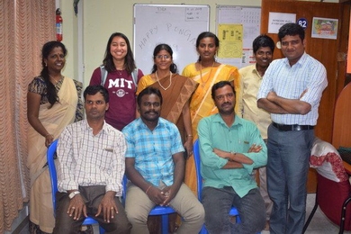 Noopur (back row, second from left) with NIEPMD staff and clients