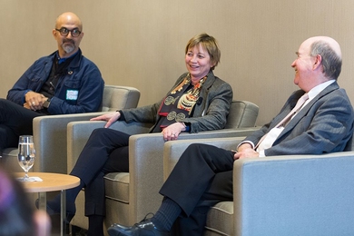 As part of MIT Climate Night, MIT Vice President for Research Maria Zuber (center) talks with John Fernández, director of the MIT Environmental Solutions Initiative (left) and Robert Armstrong, director of the MIT Energy Initiative, about their personal experiences working on climate issues and where they believe the Institute can be most influential.