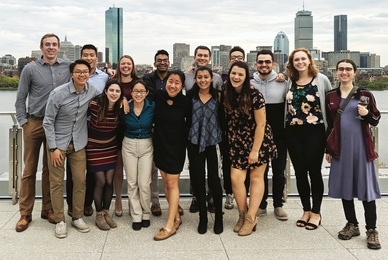 The CEE Class of 2019 gathered at MIT's Samberg Conference Center for a photo with the Boston skyline as the backdrop.