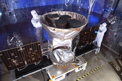 The Transiting Exoplanet Survey Satellite is inspected before its launch in April 2018. Approximately 250 MIT scientists and engineers are included as recipients of the NASA Silver Achievement Medal for their role in the TESS mission.