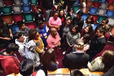 K. Renee Horton, NASA scientist and past president of the National Society of Black Physicists, speaks with students at a recent physics conference. Due to a climate that has consistently excluded African-Americans from succeeding in physics and astronomy, a new task force report urges significant cultural changes in these fields.