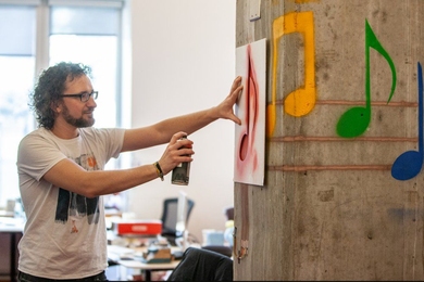 MIT postdoc Michael Wessely shows off the SprayableTech prototype.
