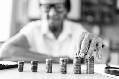 person counting coins