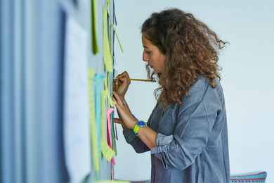 Nadia Christidi writing on a message board