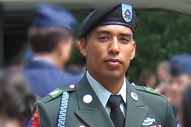 Omar Rutledge standing at ease in a U.S. Army dress uniform