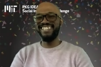 Screen capture of Thandolwethu Dlamini, smiling before a "falling confetti" Zoom background