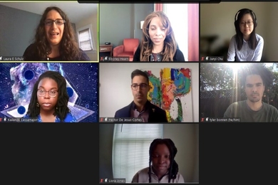 Screenshot of seven people speaking by video conferencing, arranged in three rows of 3, 3 and 1.