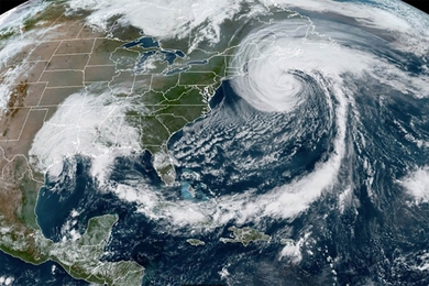 Satellite image of a swirling clouds of a hurricane over New England