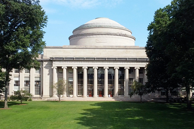 Photo of MIT's Great Dome, with grassy Killian Court in the foreground