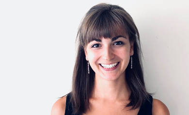 Portrait photo of Sophie Gibert against a white wall