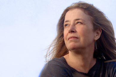 portrait photo of MIT composer Elena Ruehr, looking into the sky