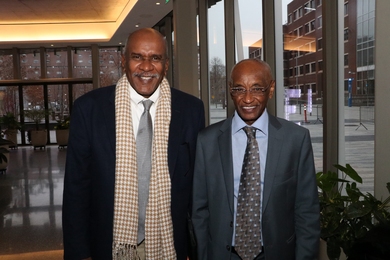 Photo of Elfatih Eltahir and Mohamed H.A. Hassan standing side-by-side