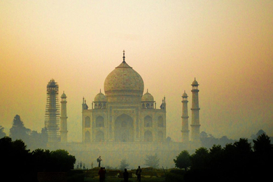Photo of the Taj Mahal in a hazy orange atmosphere