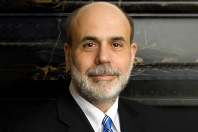 Headshot of Ben Bernanke in front of a black marble wall.