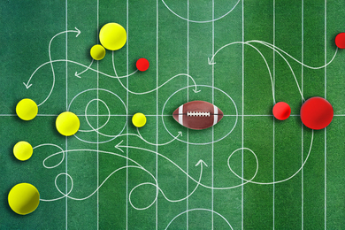 Yellow and red balls compete on an AI-generated football field. Chalk lines show possible movement, and a football is in the middle.