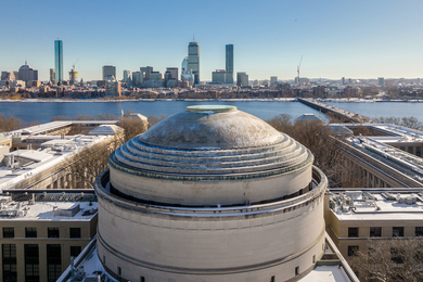 Aerial drone image of dome at MIT's campus facing the Boston skyline