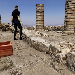 Rendering shows a figure standing in castle ruins, and a wooden box in foreground.