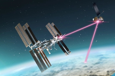 A schematic of a laser communications terminal onboard the International Space Station transmitting data over laser signals to a smaller satellite at a higher altitude; this satellite then relays the data to Earth. 