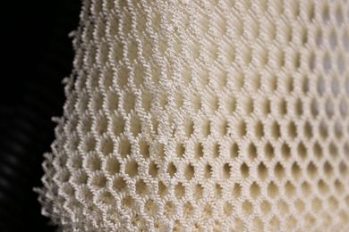 A 3D-printed stretchable network looks like a fabric with loose stitching and large pores