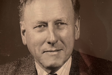 Sepia-tone headshot of Loren Graham