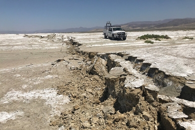 A Mobile Laser Scanning truck parked near a surface rupture in the California desert.